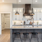 Dark stained and White bathroom cabinets