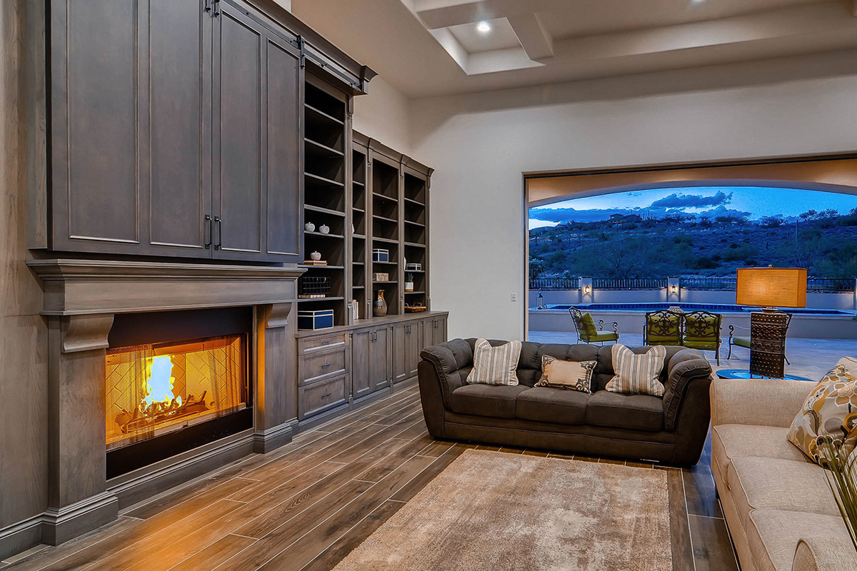 Dark stained living room cabinets