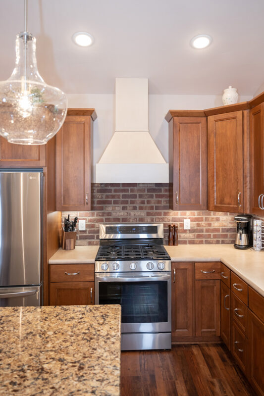 White and Warm stained kitchen cabinets