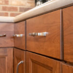 Warm stained kitchen cabinets
