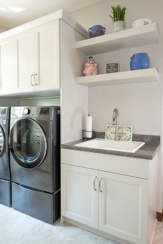 White laundry room cabinets