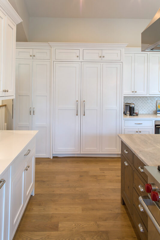 White and dark stained kitchen cabinets