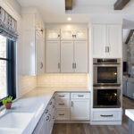 dark stained and white kitchen cabinets