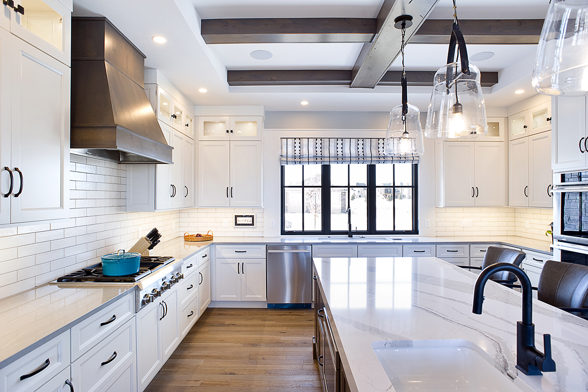 dark stained and white kitchen cabinets