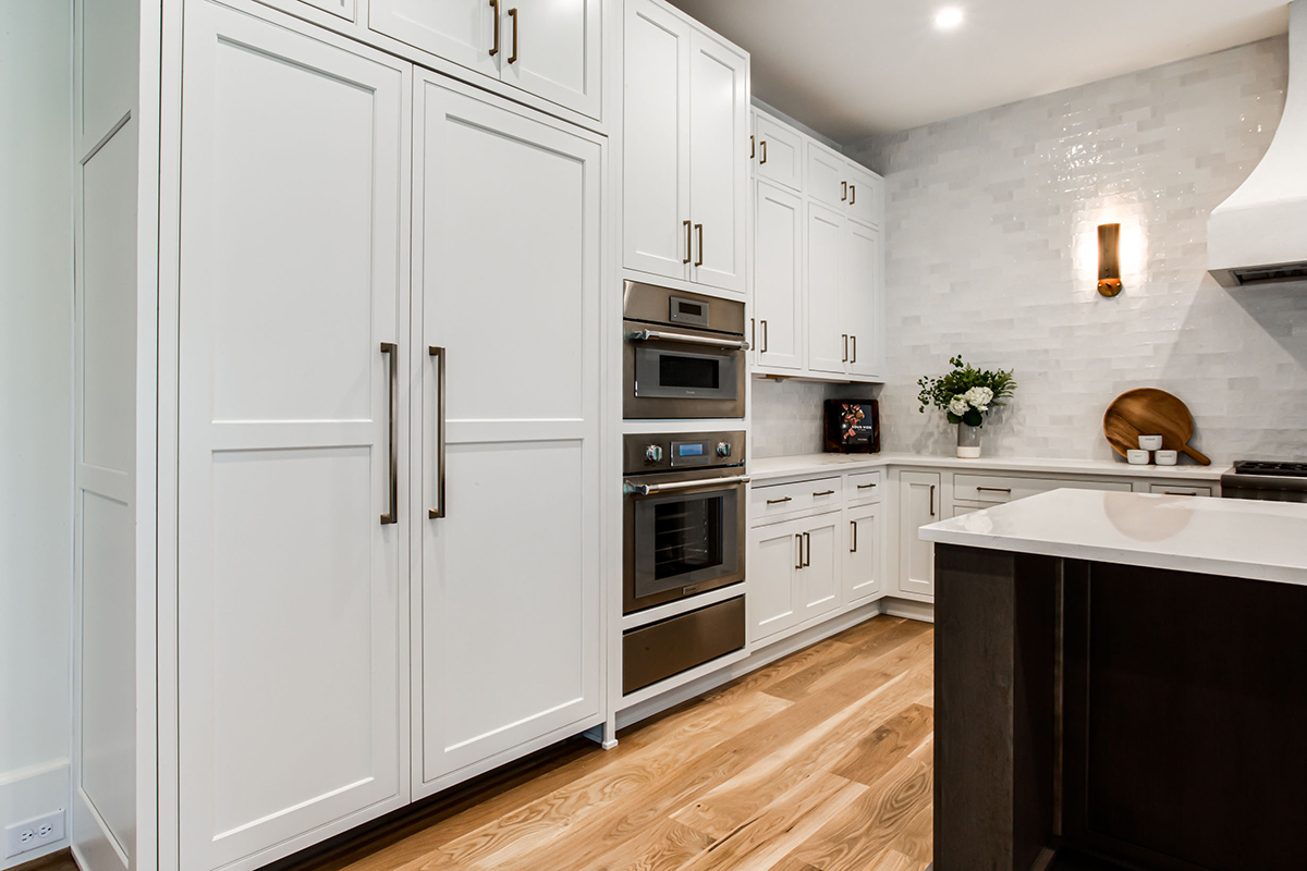 dark stained and White kitchen cabinets