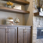 Dark stained living room cabinets