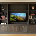 Dark stained entertainment center cabinets