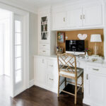 Another view of the built in desk with sun shine coming in from the doorway