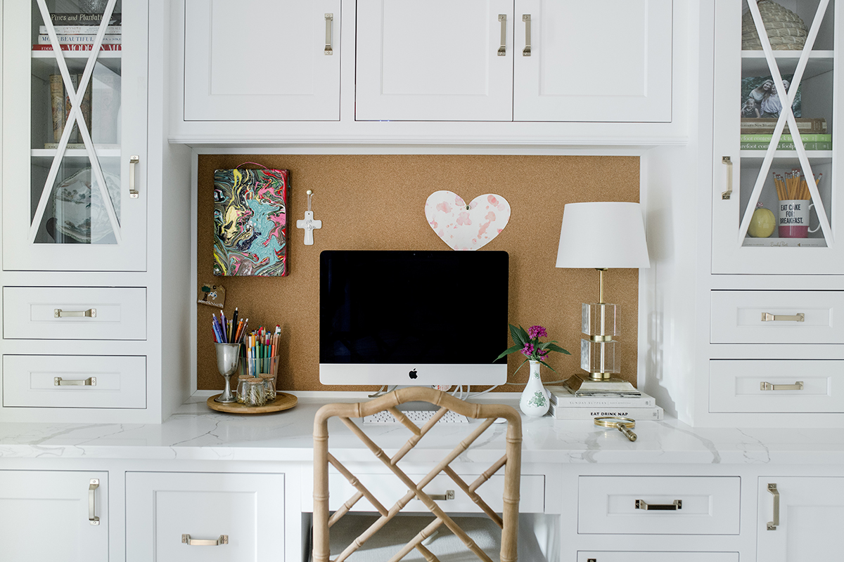 Close up of the desk with drawers and silver handles
