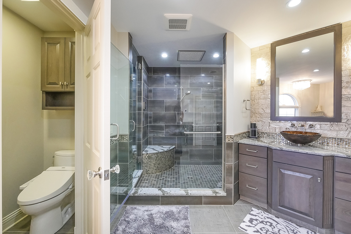 Dark stained bathroom cabinets