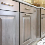 Dark stained bathroom cabinets