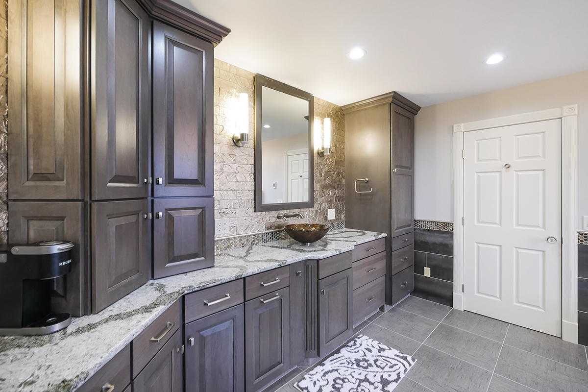 Dark stained bathroom cabinets
