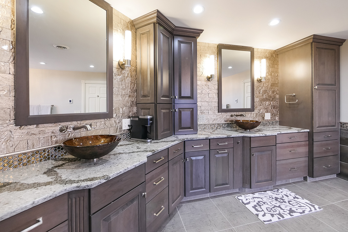 Dark stained bathroom cabinets