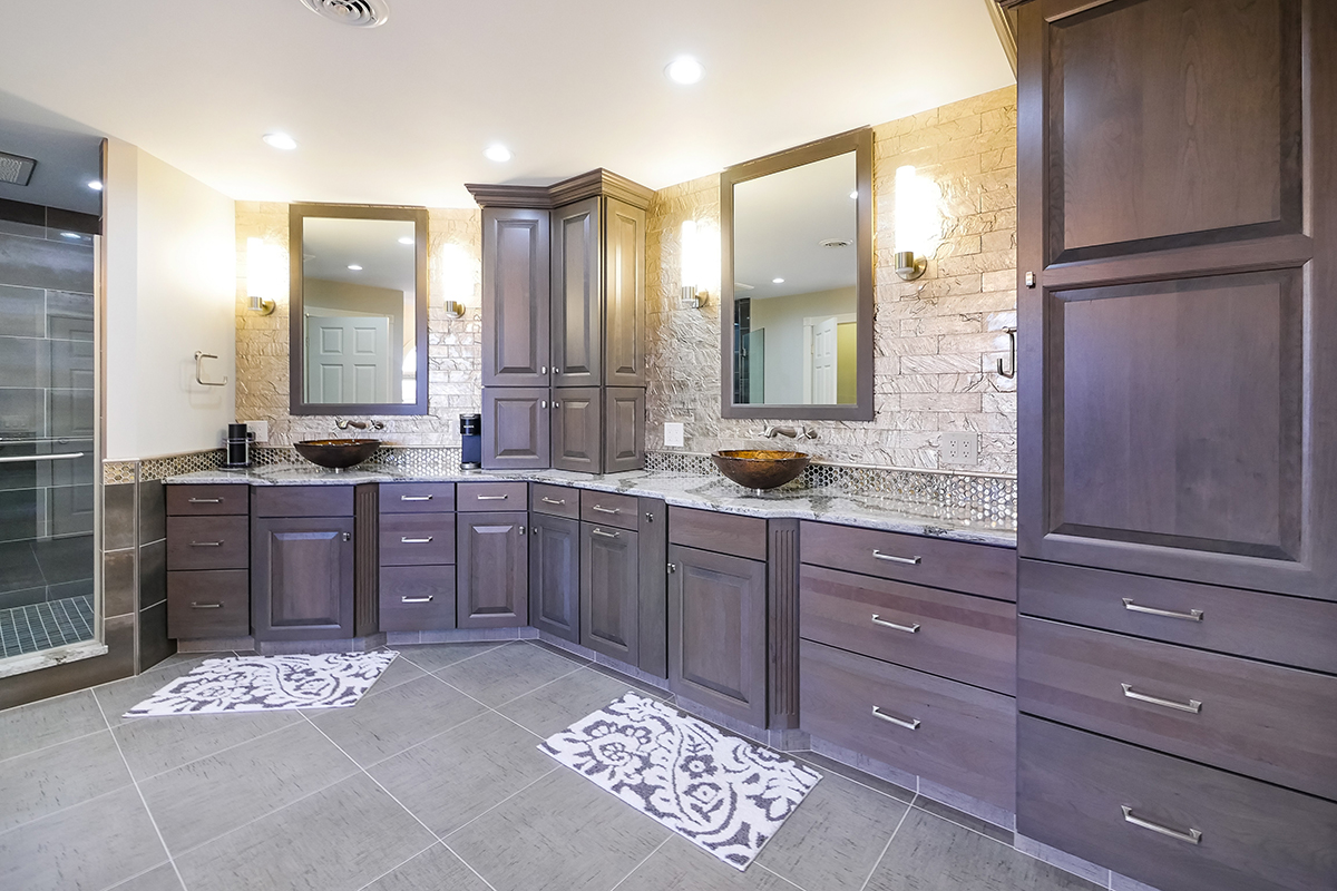 Dark stained bathroom cabinets