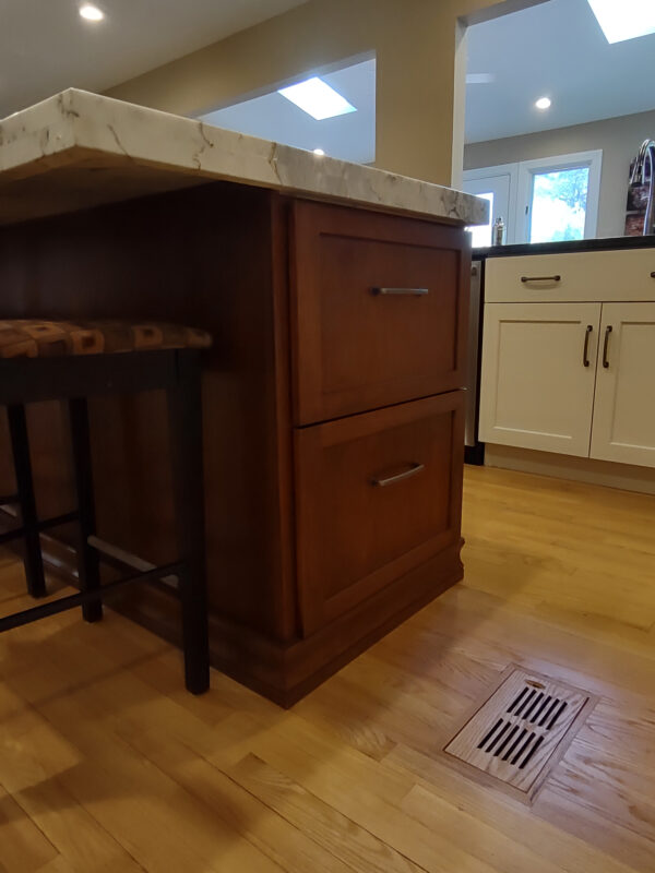 warm stained and white kitchen cabinets
