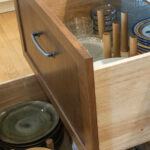 Dark stianed cabinet drawers