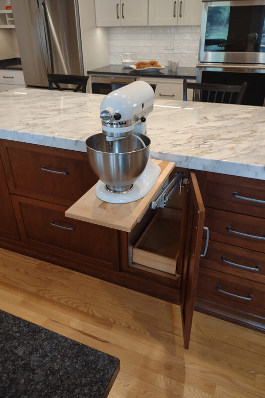 Warm stained and white kitchen cabinets