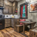 Built in breakfast nook in the kitchen made out of weathered wood.