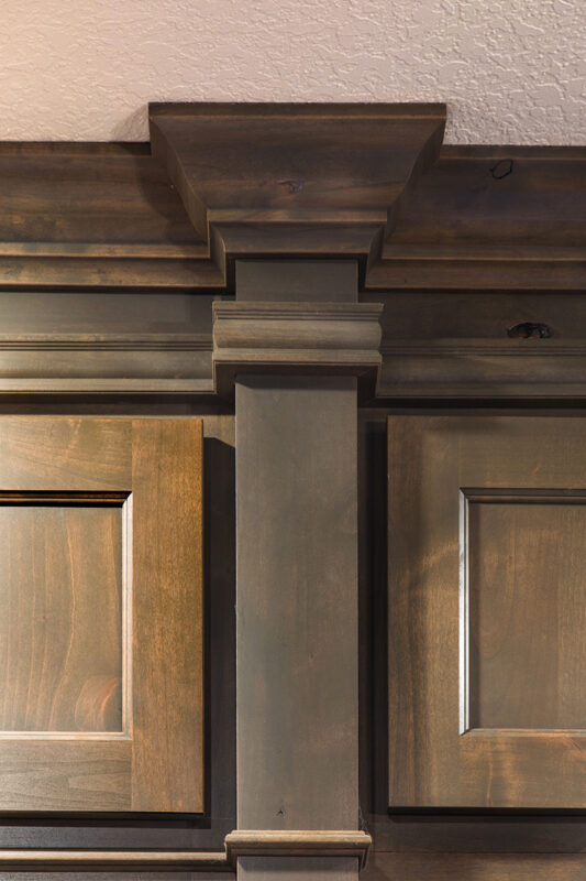 crown molding around the corner of the wall cap.