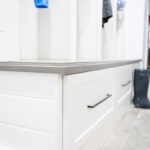 Close up with the counter top edge at the seat of the lockers