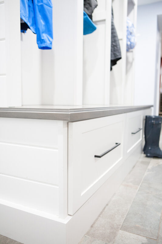 Close up with the counter top edge at the seat of the lockers