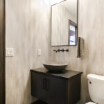 Floating sink and cabinets in the bathroom.