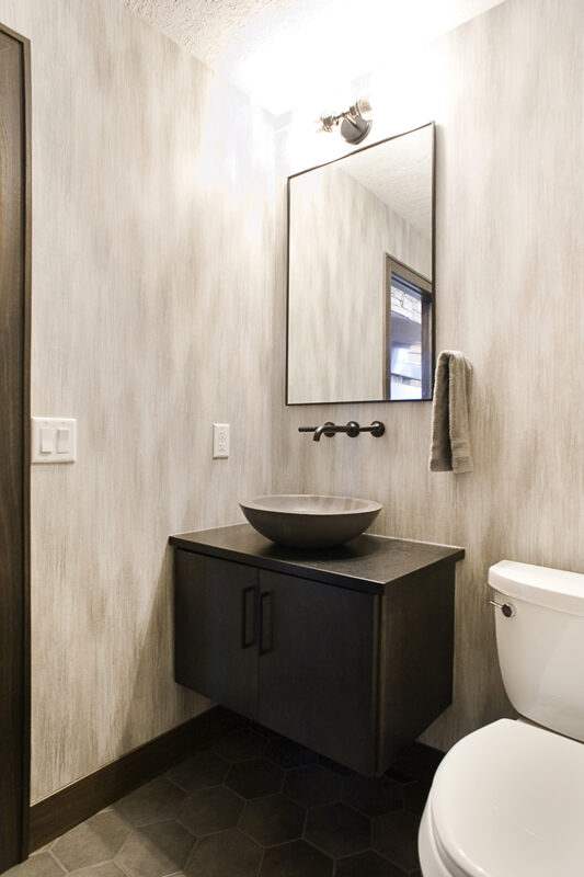 Floating sink and cabinets in the bathroom.