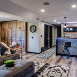 Shows built in cabinets in the back of the family room