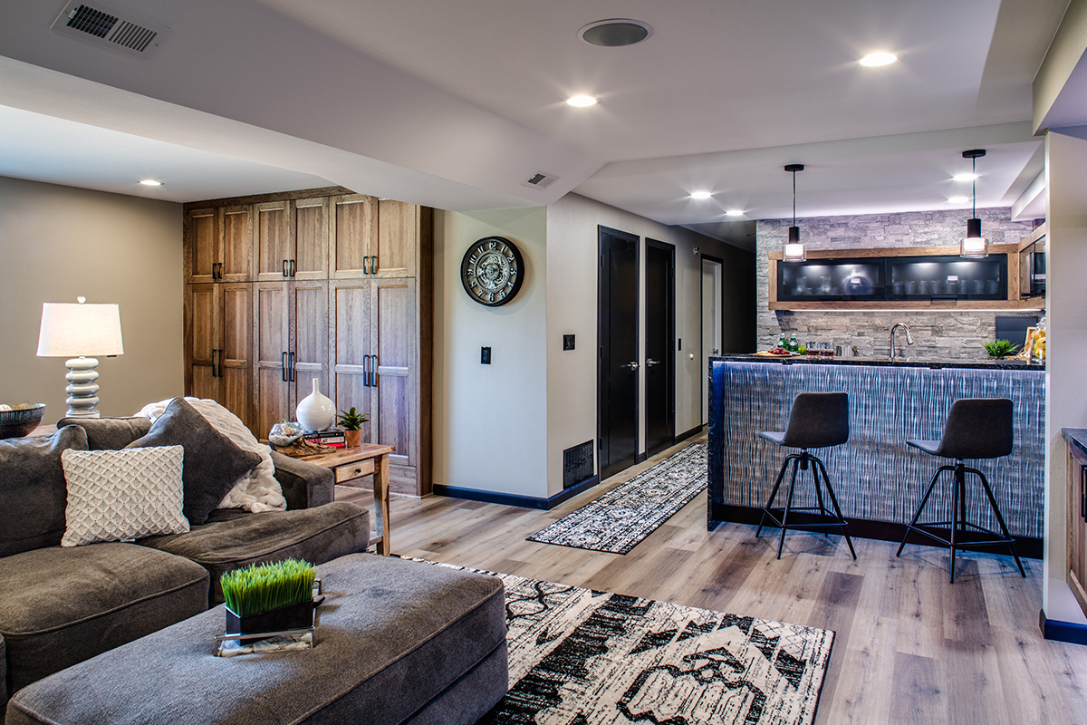 Shows built in cabinets in the back of the family room