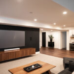 Another view of the walnut built in entertainment center with a view of the wine fridge in the family room.