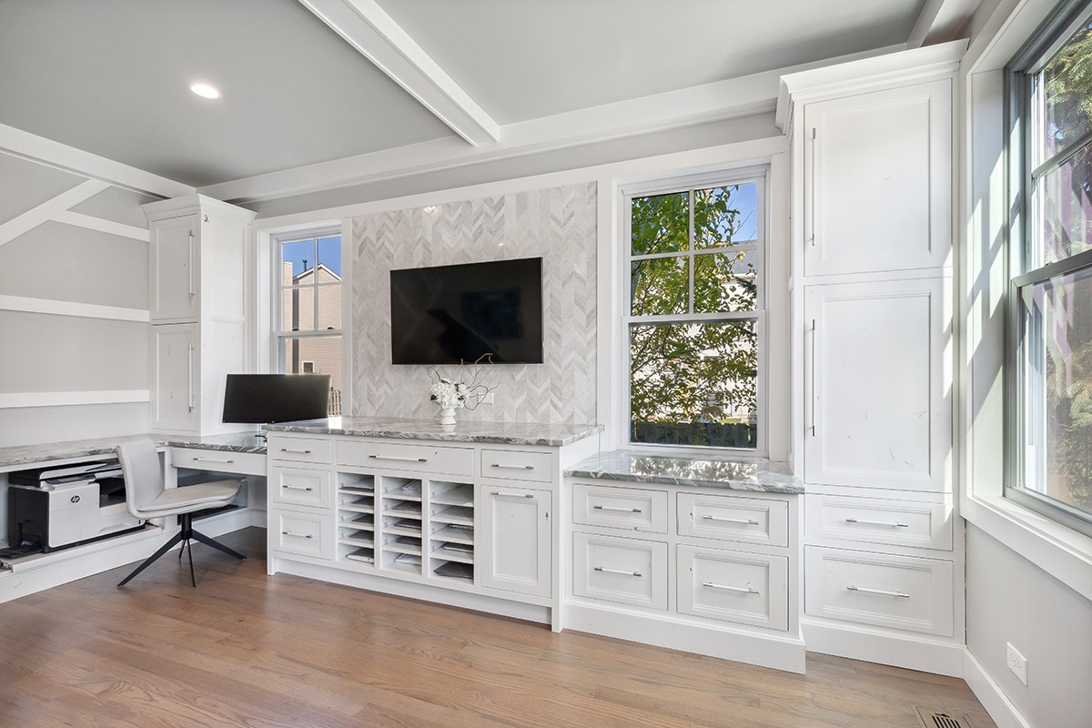 Another view of the office built ins. With the computer monitor and the cabinets around the desk