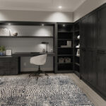Shows a different angle of the murphy bed up and the built in shelving.