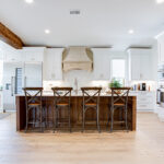 The hickory island in the middle of the kitchen. Wide view of the kitchen.