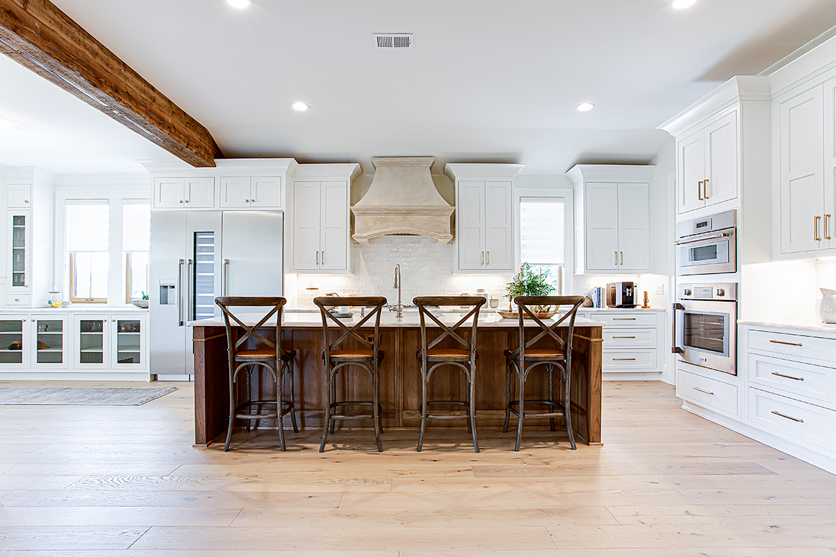 The hickory island in the middle of the kitchen. Wide view of the kitchen.