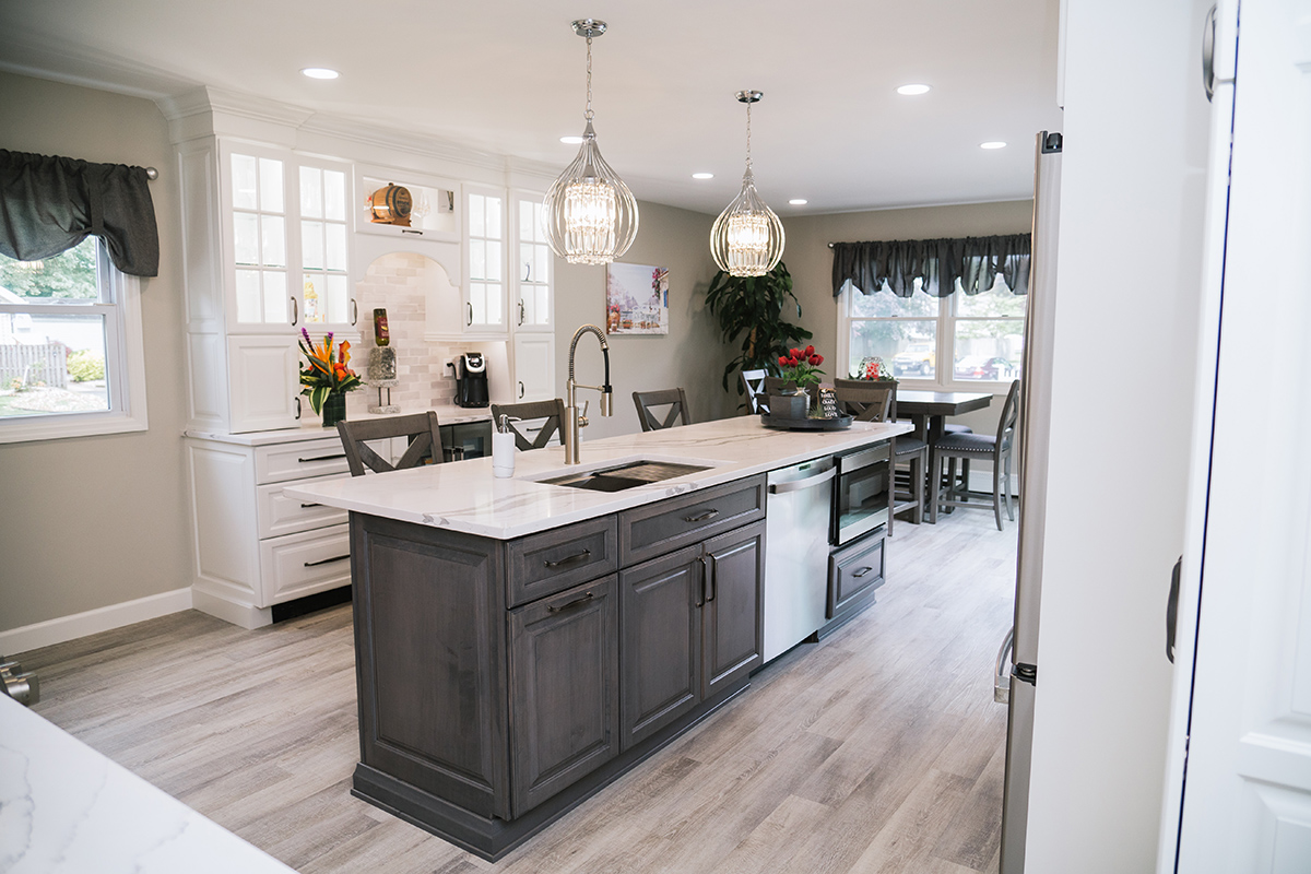 Another a view of the dark grey island and the black hardware. The island is narrow compared to other islands.