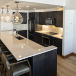 An overview of the kitchen island looking into the small kitchen space.