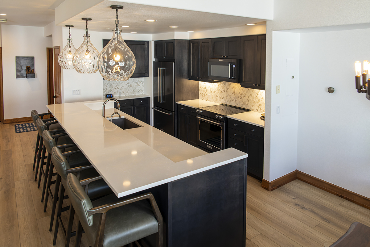 An overview of the kitchen island looking into the small kitchen space.