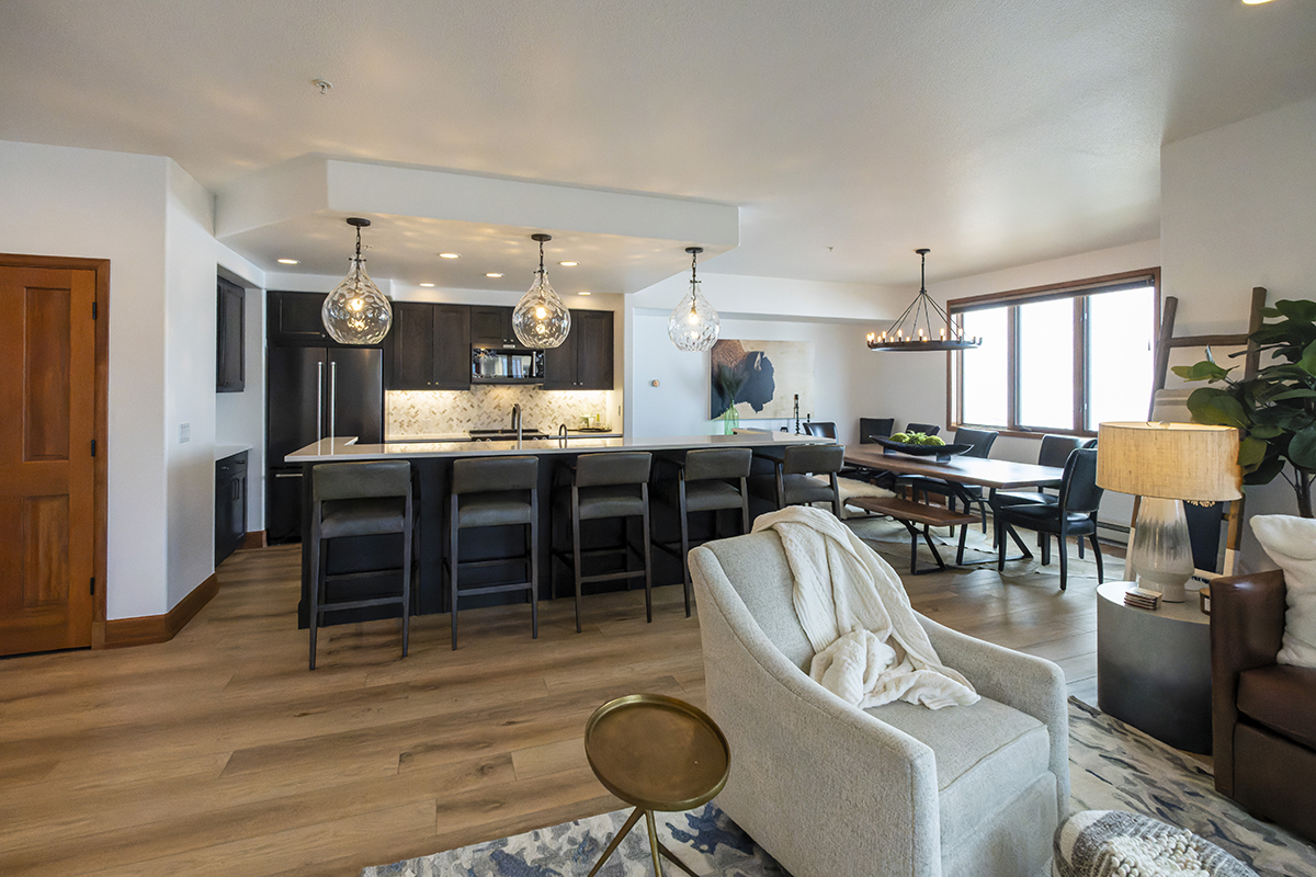 A view of the kitchen and dining room space from the living room.