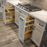 kitchen utensil specific cabinets, white kitchen vanity.