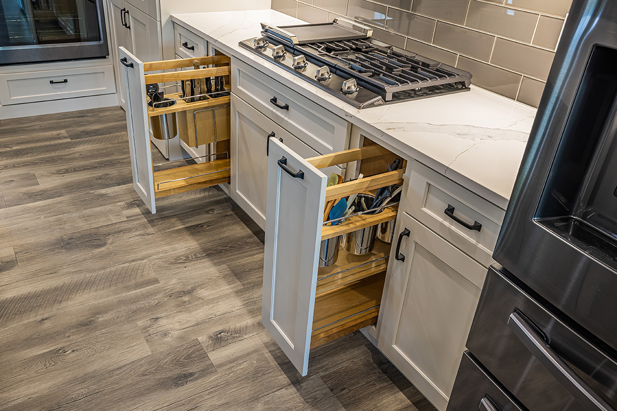 kitchen utensil specific cabinets, white kitchen vanity.