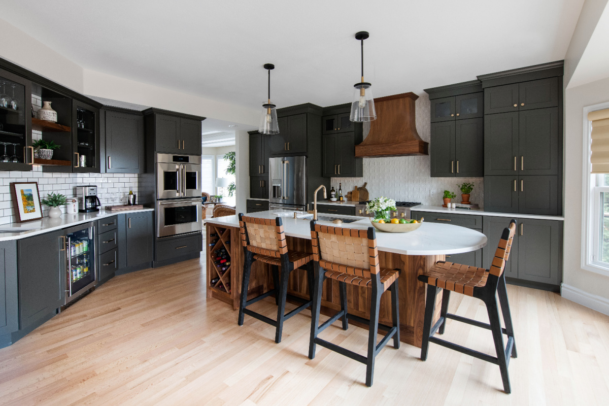 Painted kitchen with walnut island and hood