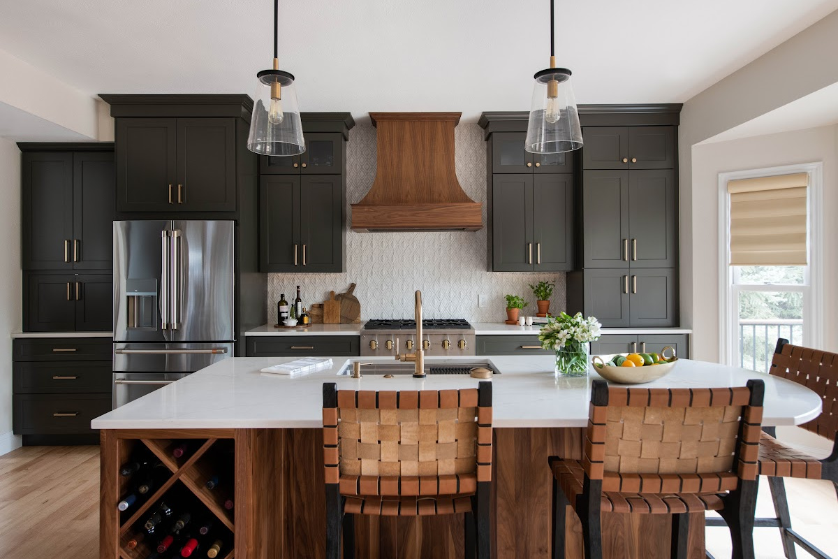 Painted kitchen with walnut island and hood