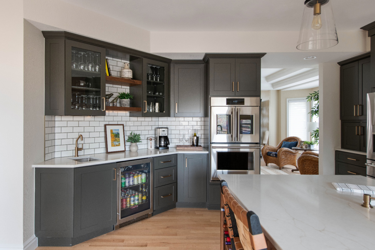 Painted kitchen with walnut island and hood
