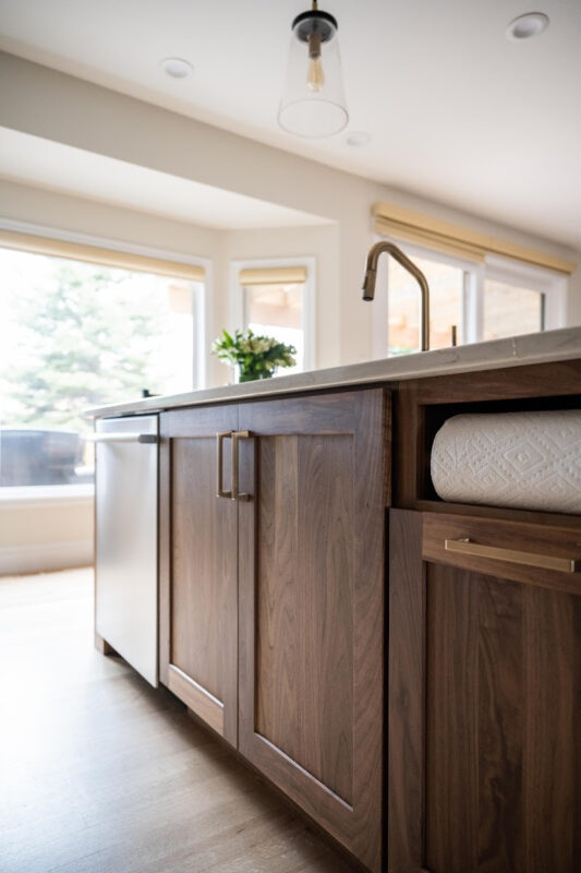 Painted kitchen with walnut island and hood
