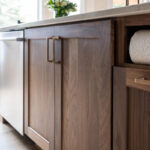 Painted kitchen with walnut island and hood
