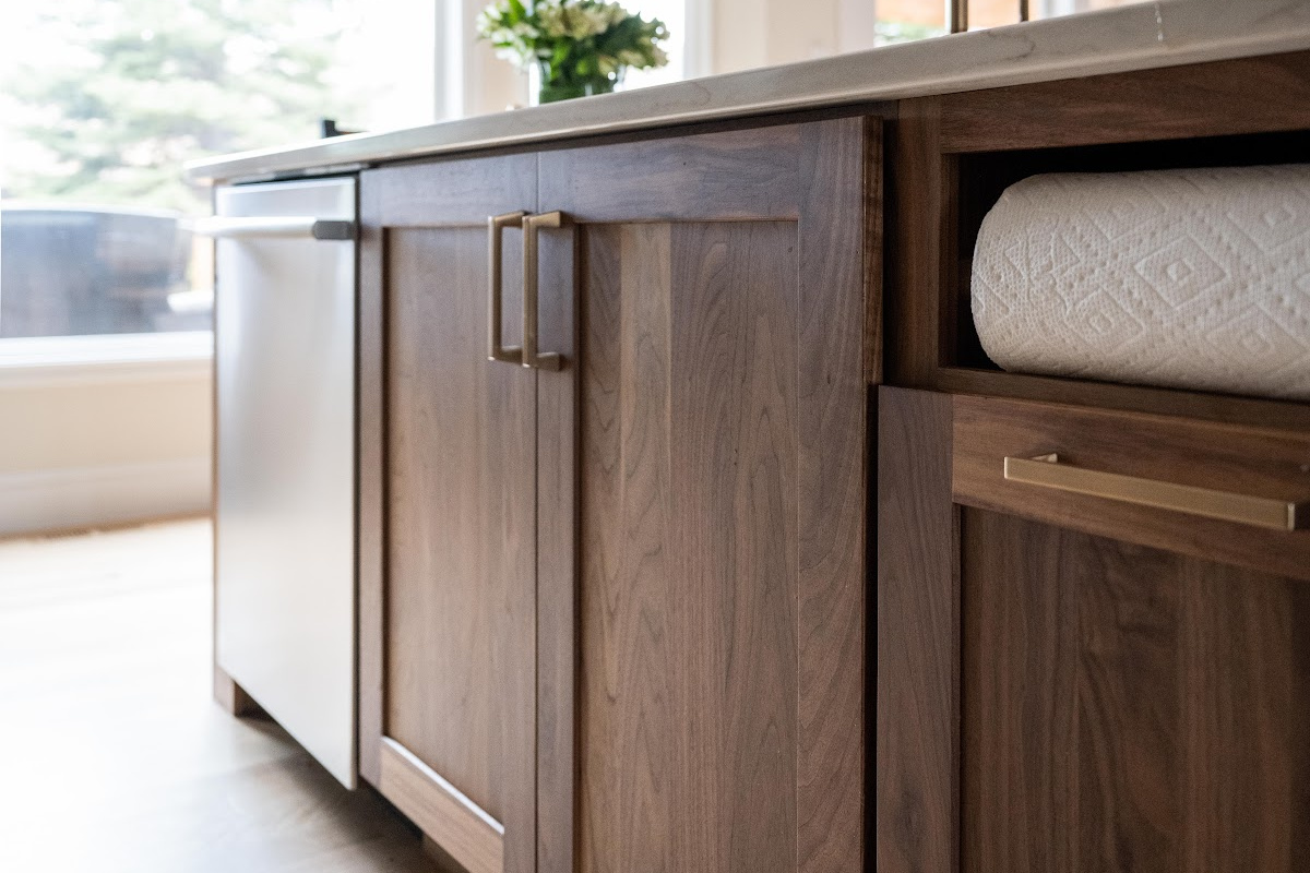 Painted kitchen with walnut island and hood