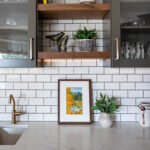 Painted kitchen with walnut island and hood