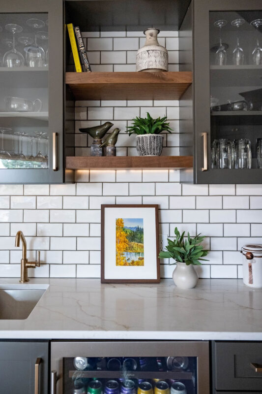 Painted kitchen with walnut island and hood