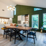 Open Space White Kitchen with accent green wall