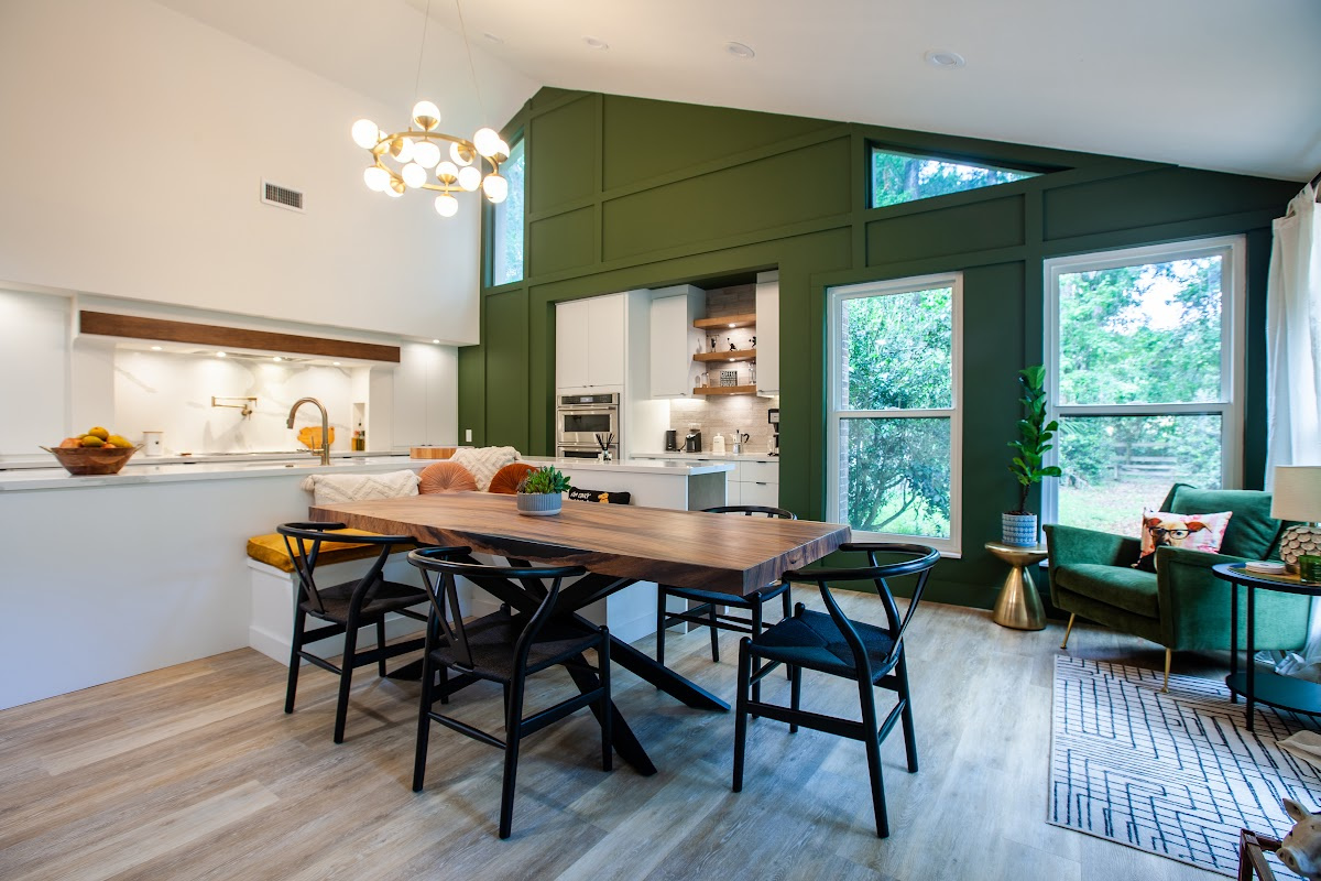 Open Space White Kitchen with accent green wall